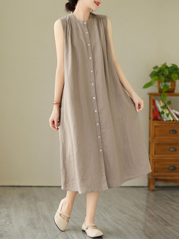 Robe mi-longue boutonnée plissée coupe trapèze, sans manches, à col rond, couleur unie