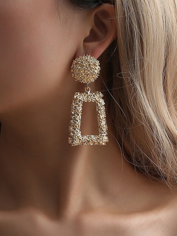 Boucles d'oreilles pendantes géométriques ajourées couleur unie