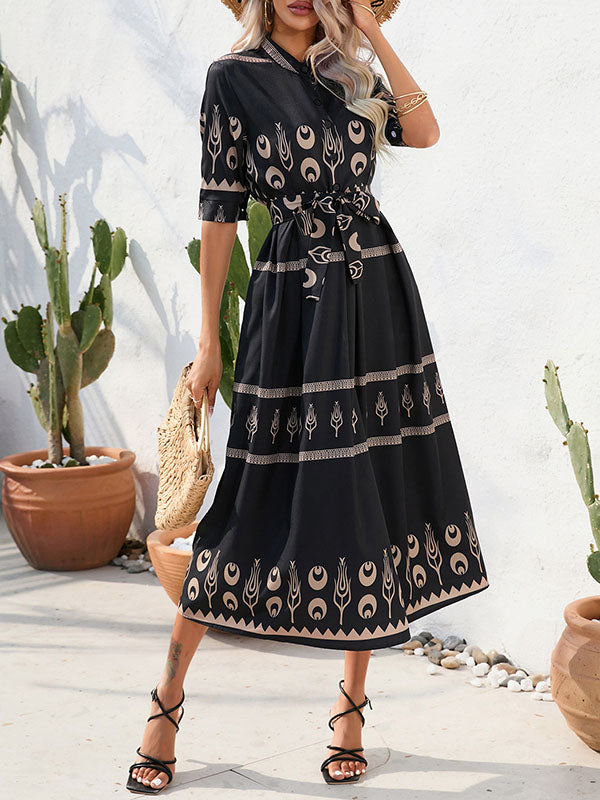 Robe mi-longue boutonnée coupe trapèze, à manches mi-longues, à taille nouée, à col revers