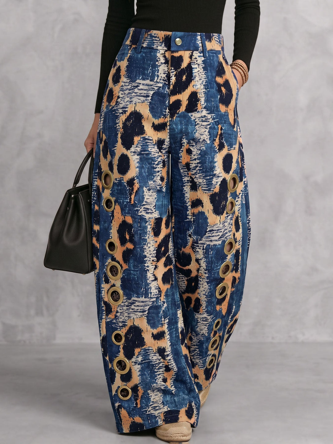 Pantalon ajouré boutonné à fermeture éclair, à empiècements, à poches, à imprimé léopard, à jambes larges, taille haute