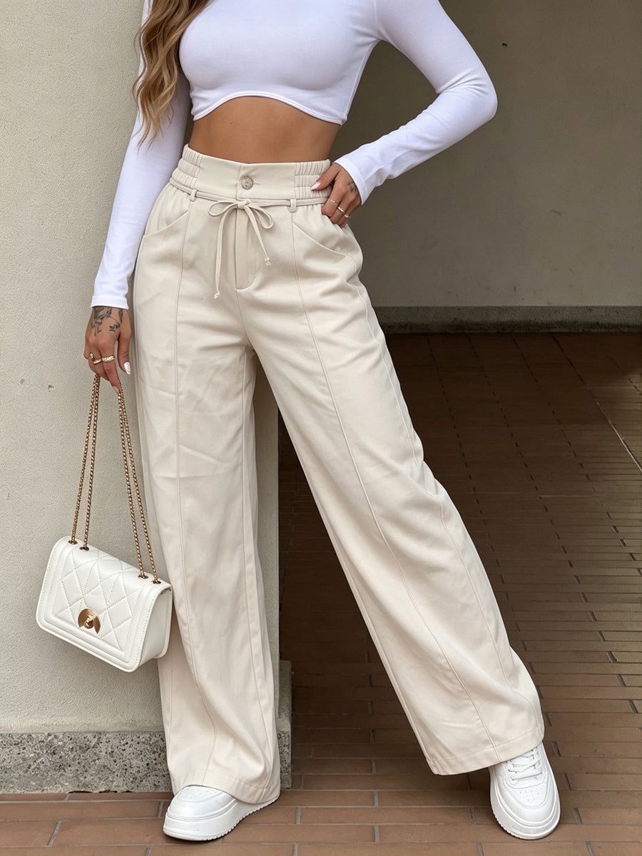 Pantalon ample à poches, à taille élastique, à jambes larges, couleur unie
