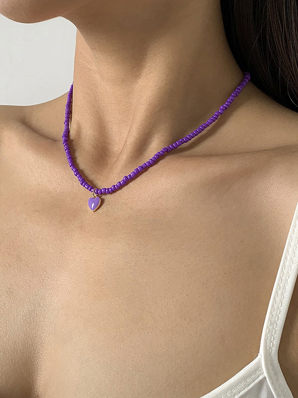 Collier à perles, couleur unie