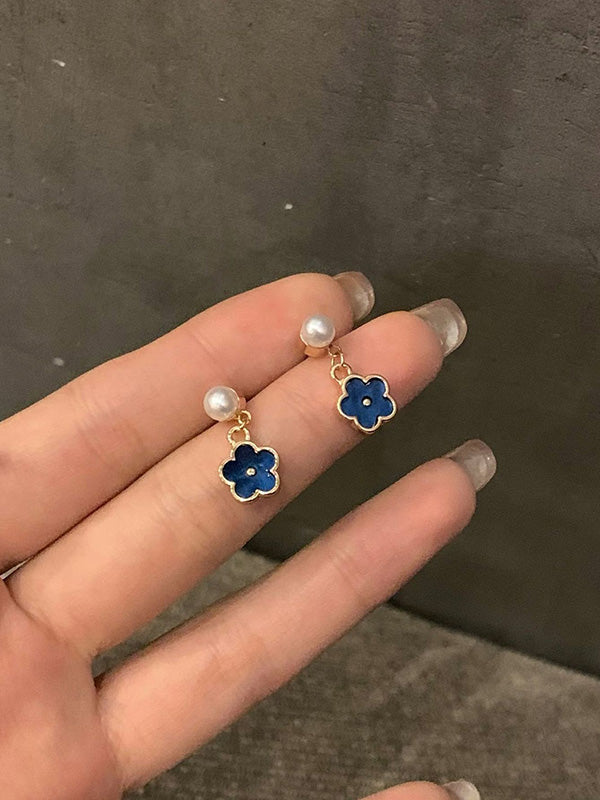 Accessoires de boucles d'oreilles en forme de fleur à géométrie vintage