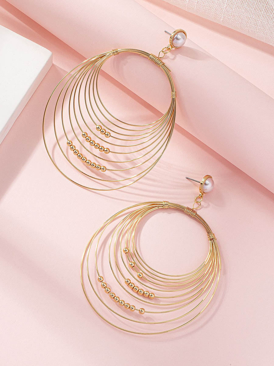 Boucles d'oreilles géométriques à coupe irrégulière