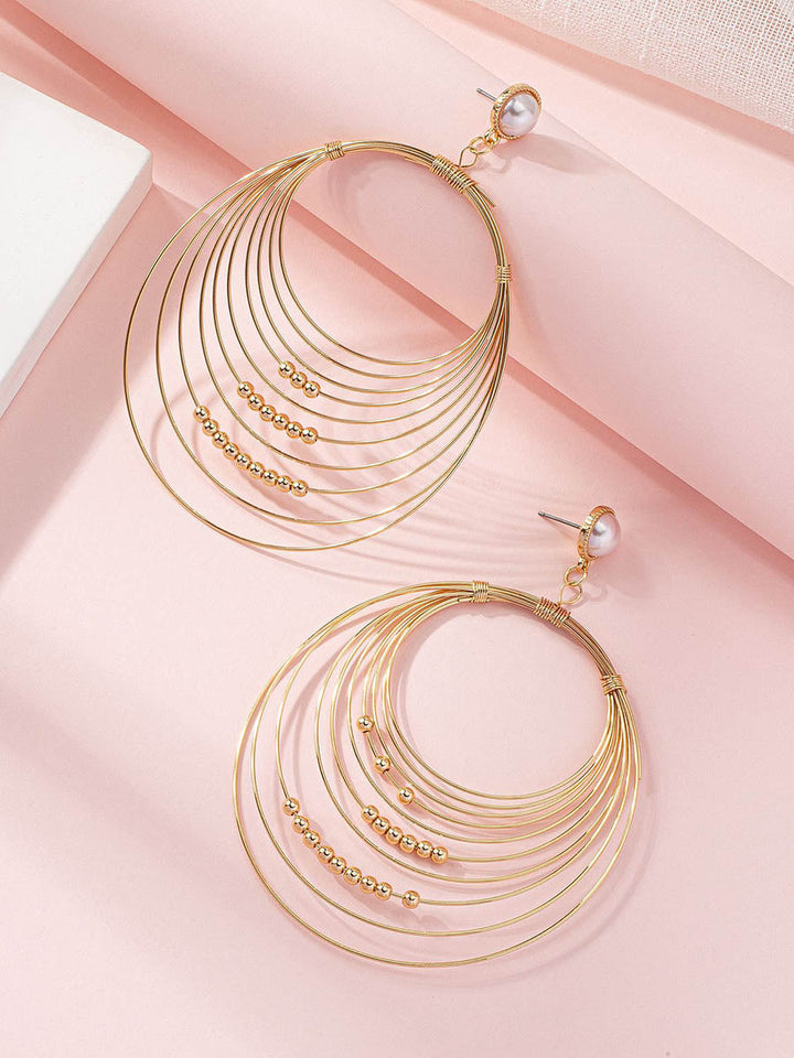 Boucles d'oreilles géométriques à coupe irrégulière