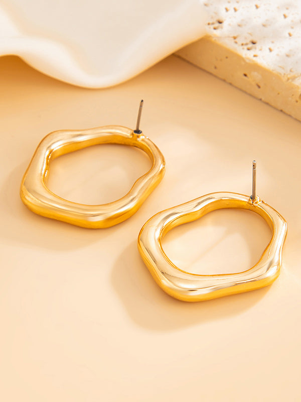 Boucles d'oreilles brillantes à coupe irrégulière