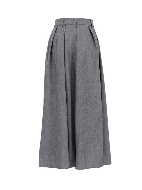 Jupe plissée coupe trapèze, taille haute, sans ceinture, couleur unie