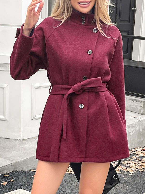 Veste ample boutonnée à manches longues, à empiècements, à taille nouée, à col montant, couleur unie