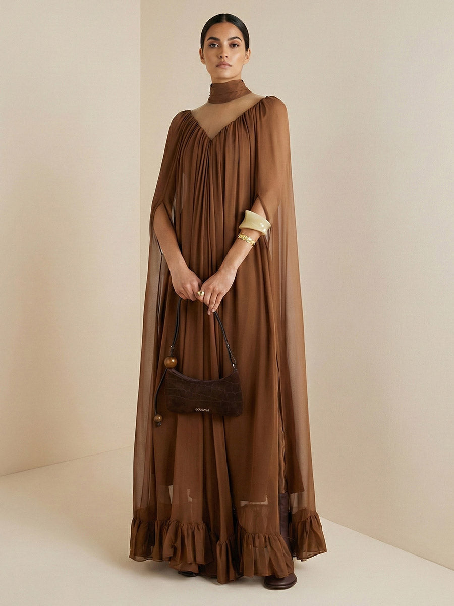 Robe longue superposée plissée volantée transparente style cape, à coupe irrégulière, à empiècements, à col haut, couleur unie