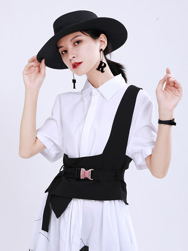 Gilet noir avec boucle de ceinture élégante