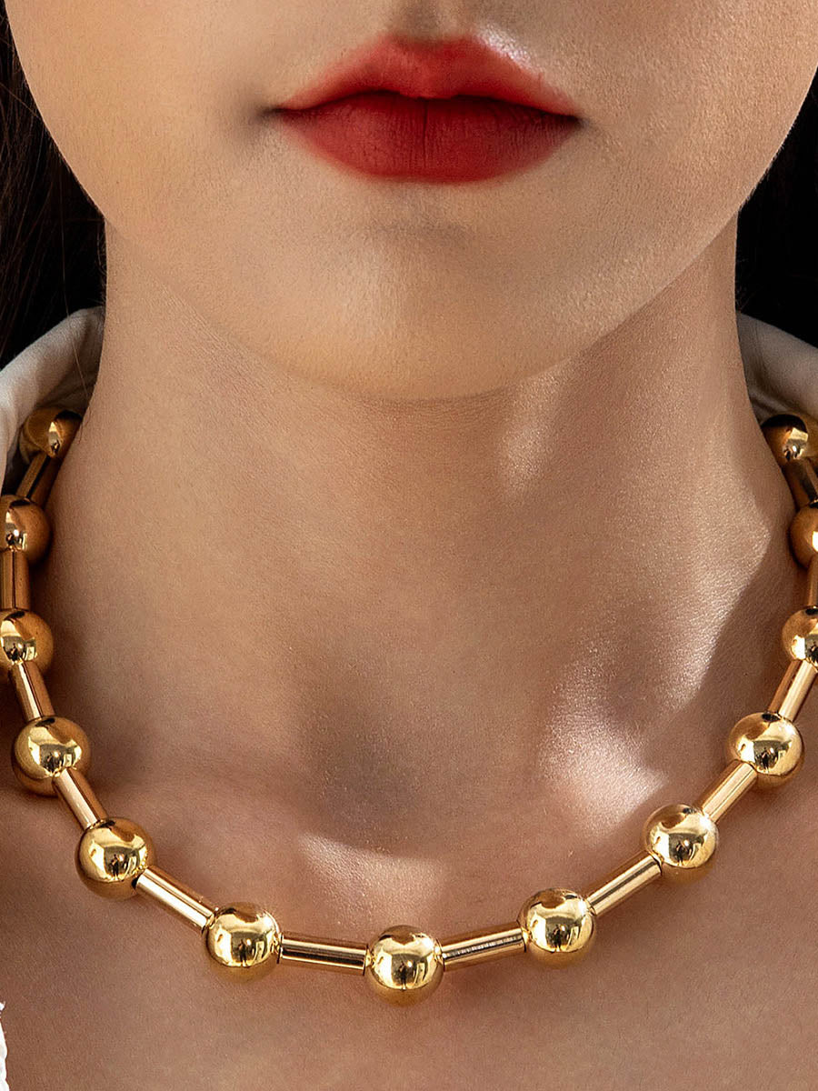 Parure collier et boucles d'oreilles géométrique couleur unie