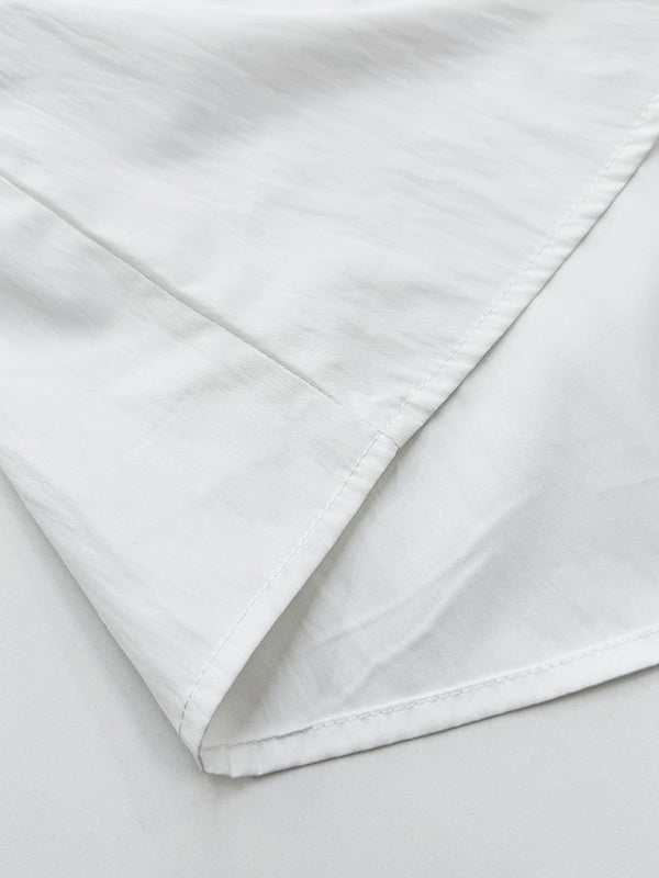 Robe longue ample plissée à manches évasées, à empiècements, à col rond, couleur unie