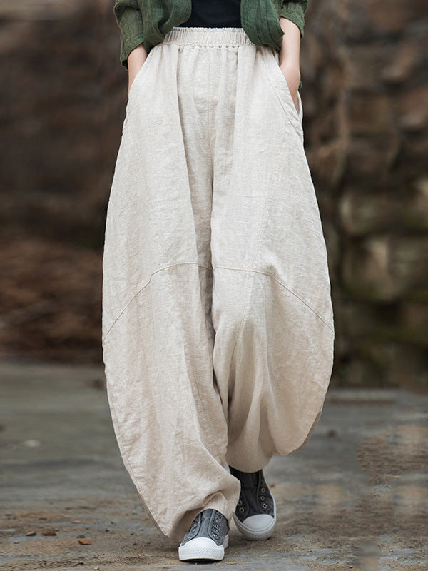 Pantalon ample à taille élastique, à poches, à empiècements, couleur unie