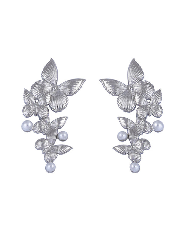 Boucles d'oreilles brillantes en forme de papillon