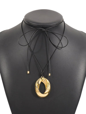 Collier réglable géométrique ajouré couleur unie