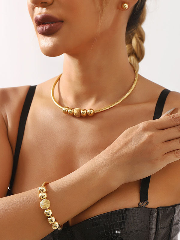 Ensemble trois pièces géométrique – collier + bracelet + boucles d'oreilles