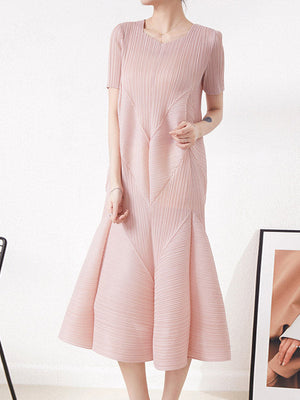 Robe mi-longue ample plissée taille haute, à col rond, couleur unie