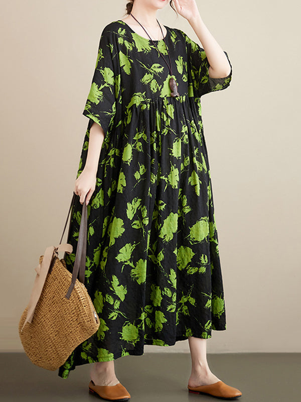 Robe mi-longue ample plissée à fleurs, à col rond