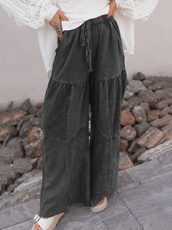 Pantalon ample plissé taille haute, à cordon de serrage, à poches, à empiècements, couleur unie