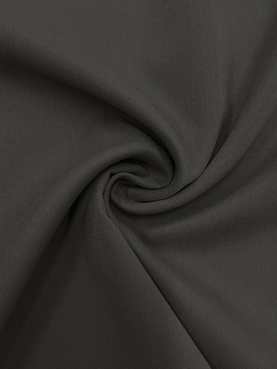 Pantalon ample plissé taille haute, à empiècements, couleur unie