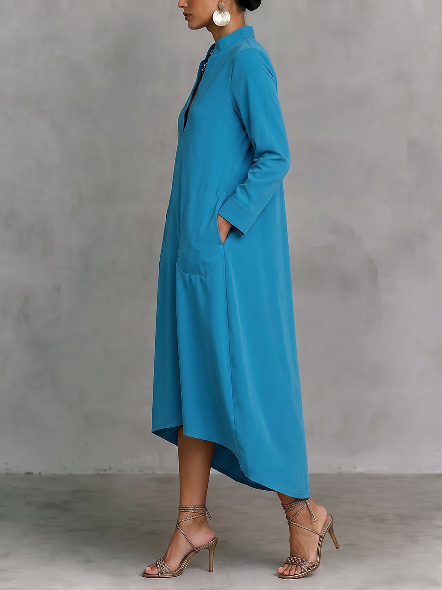 Robe mi-longue ample à poches, à manches longues, à col en V, couleur unie