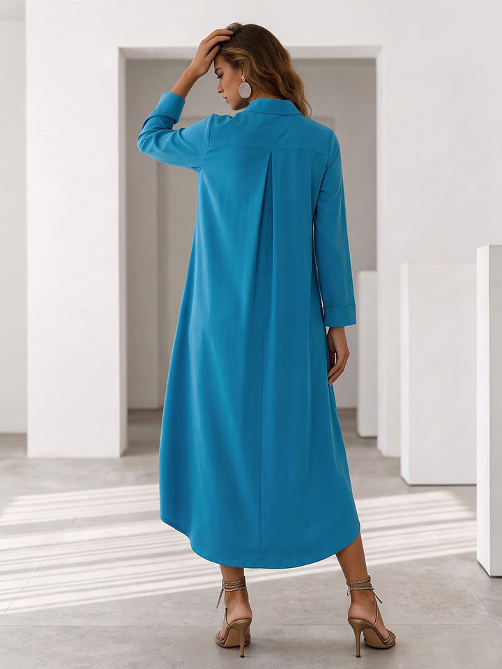 Robe mi-longue ample à poches, à manches longues, à col en V, couleur unie