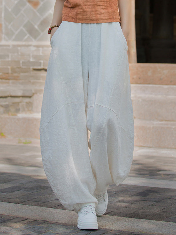 Pantalon ample à taille élastique, à poches, à empiècements, couleur unie