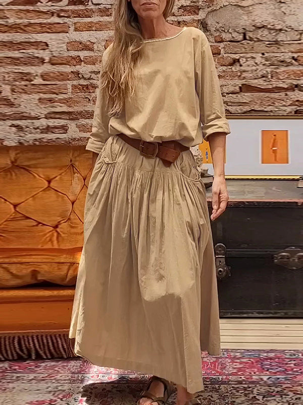 Robe longue ample plissée à manches raglan, à empiècements, à col rond, couleur unie