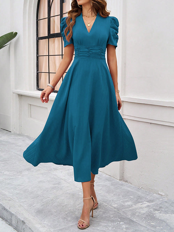 Robe longue plissée coupe trapèze, taille haute, à fermeture éclair, à col en V, couleur unie
