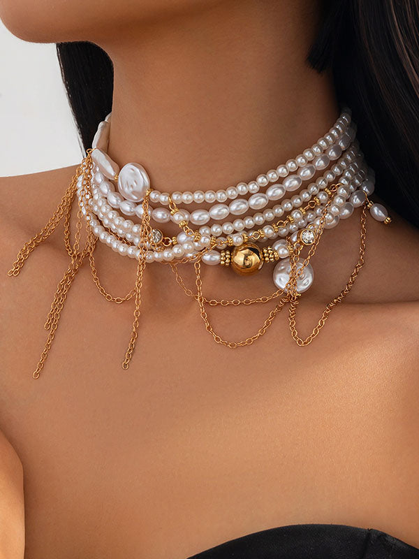 Collier géométrique superposé à pompons