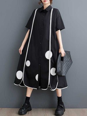 Robe chemise boutonnée fendue devant coupe trapèze, à manches mi-longues, à poches, à pois, à empiècements, à col revers