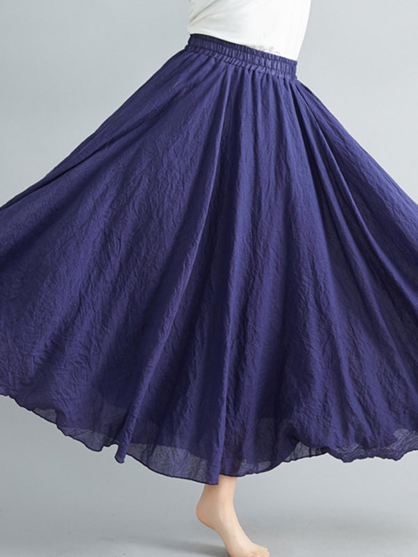 Jupe ample plissée coupe trapèze, à taille élastique, couleur unie