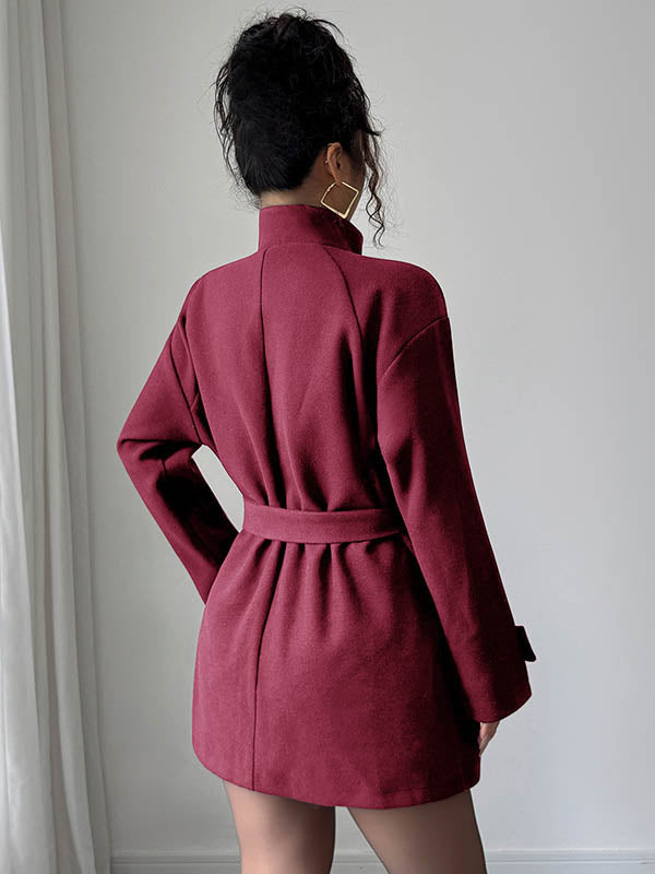 Veste asymétrique boutonnée à taille élastique, taille haute, à taille nouée, à col montant, couleur unie
