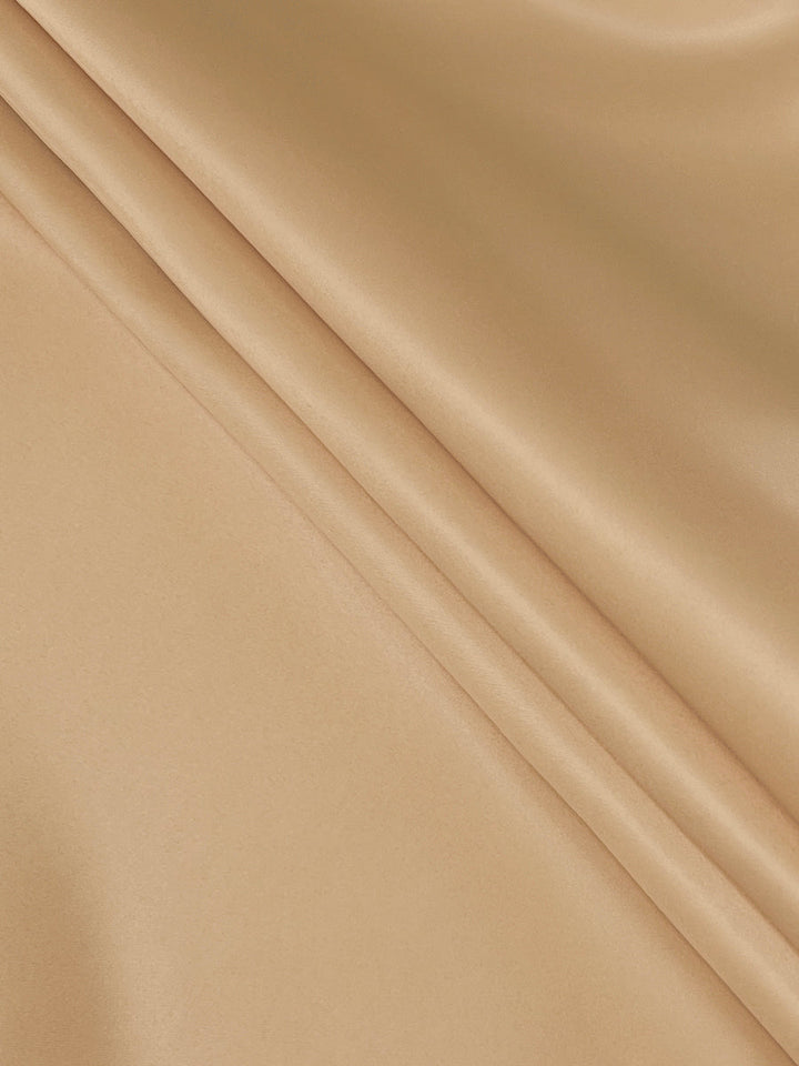 Robe longue plissée coupe trapèze, taille haute, à col en V, couleur unie