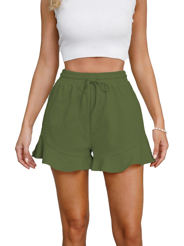 Short ample à jambes larges, à cordon de serrage, à taille élastique, à empiècements, couleur unie