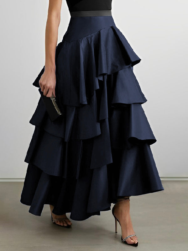 Jupe longue coupe trapèze, taille haute, à falbalas, couleur unie