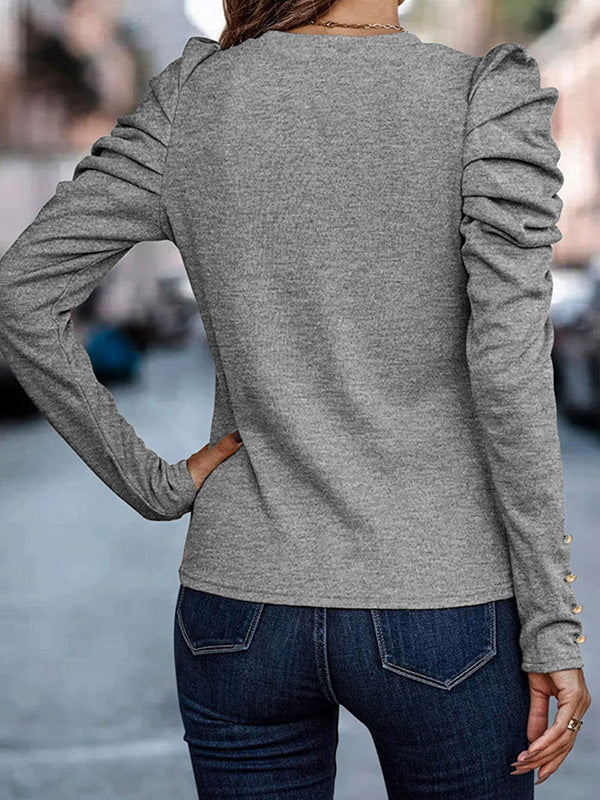 T-shirt boutonné plissé à manches bouffantes, à manches longues, à col rond