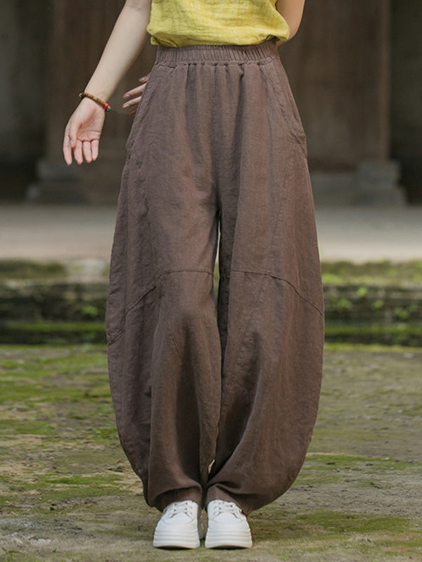 Pantalon ample à taille élastique, à poches, à empiècements, couleur unie