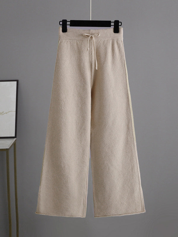 Pantalon urbain ample à manches longues, à col rond, à ourlet plongeant, à jambes larges, couleur unie