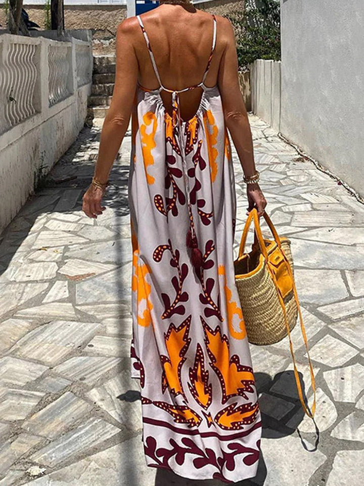 Robe mi-longue plissée imprimée coupe trapèze, taille haute, à empiècements, à fines bretelles, couleur contrastée