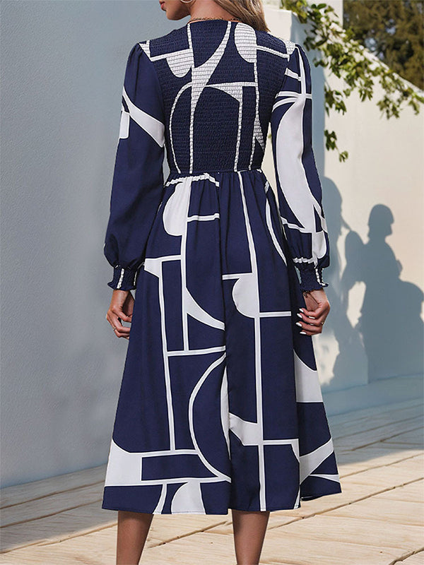 Robe mi-longue imprimée coupe trapèze, taille haute, à taille élastique, à empiècements, à col rond
