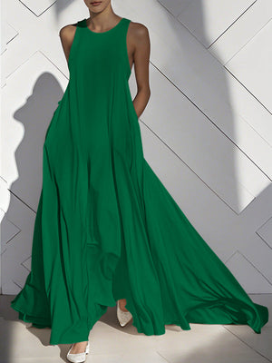 Robe longue ample sans manches, à poches, à empiècements, à col rond, couleur unie
