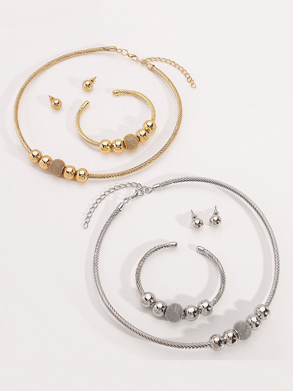 Ensemble trois pièces géométrique – collier + bracelet + boucles d'oreilles