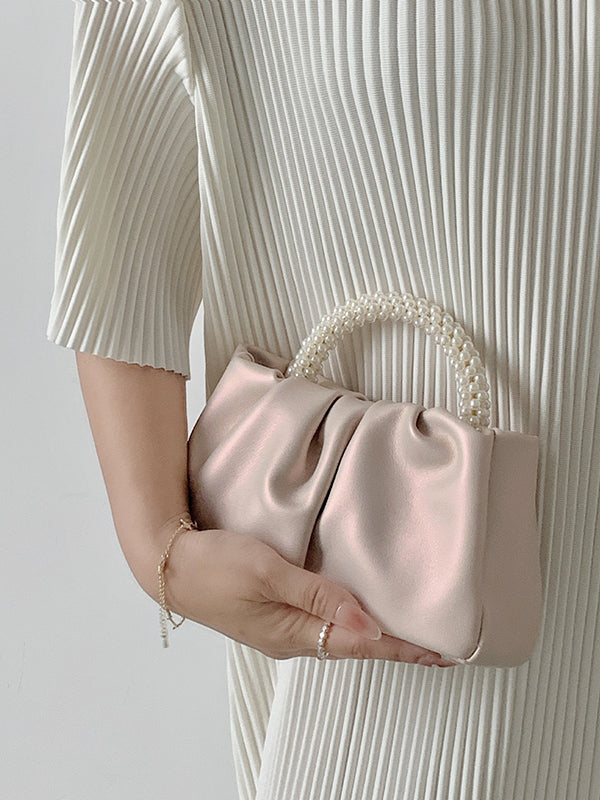 Sac à main perlé à empiècements