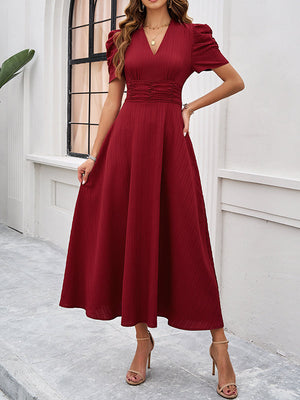 Robe longue plissée coupe trapèze, taille haute, à fermeture éclair, à col en V, couleur unie