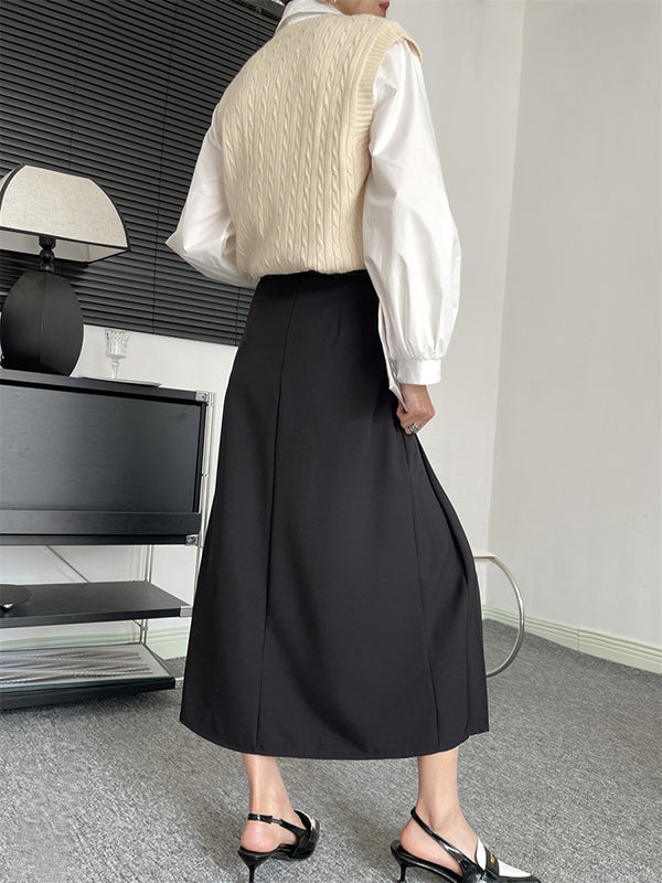 Jupe plissée coupe trapèze, taille haute, à empiècements, couleur unie