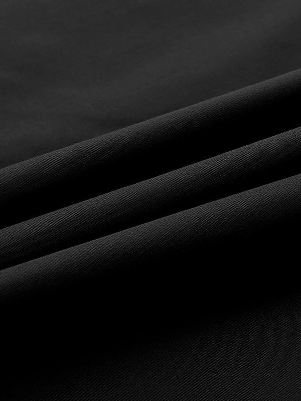 Robe longue ample à manches longues, à empiècements, à col en V, couleur unie