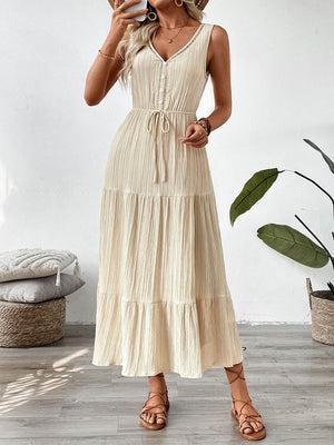 Robe longue boutonnée plissée coupe trapèze, taille haute, à taille nouée, à col en V, couleur unie