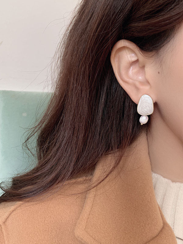 Boucles d'oreilles asymétriques simples à géométrie de perles