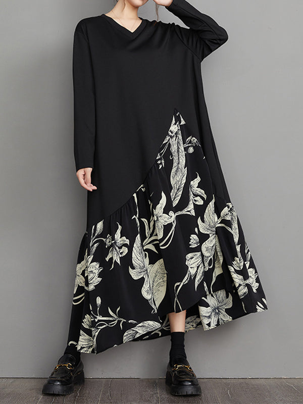 Robe mi-longue asymétrique coupe trapèze, à ourlet plongeant, à imprimé floral, à empiècements, à col en V
